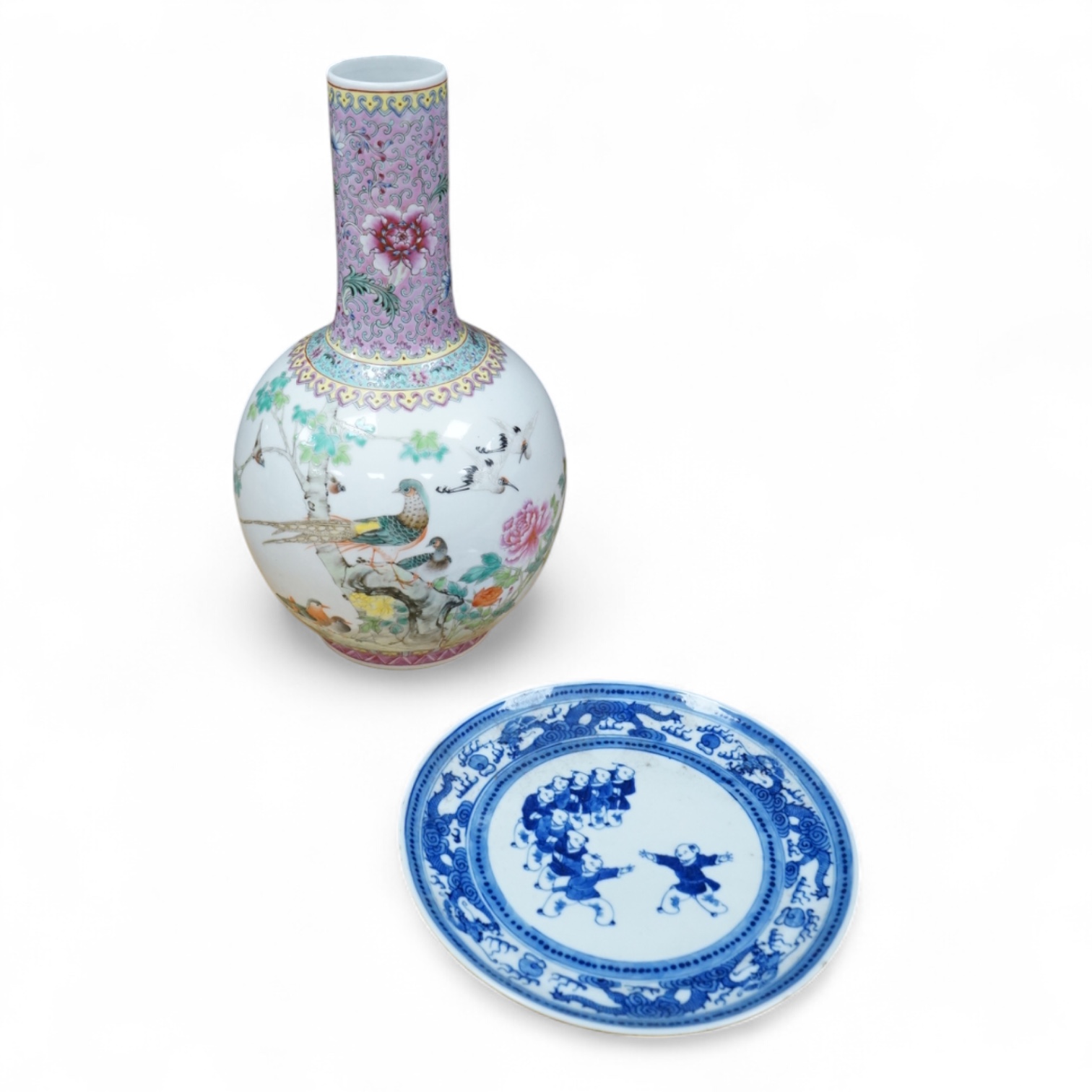 A Chinese famille rose vase, mid 20th century and a Chinese blue and white ‘boys’ dish, c.1900, vase 33cm high